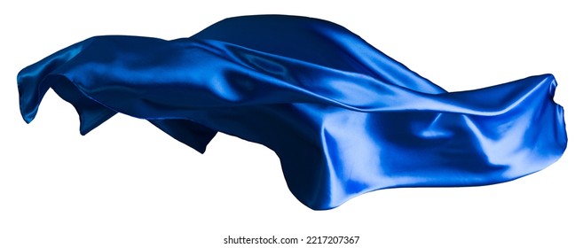 Blue cloth flutters in the wind. Isolated on white background - Shutterstock ID 2217207367