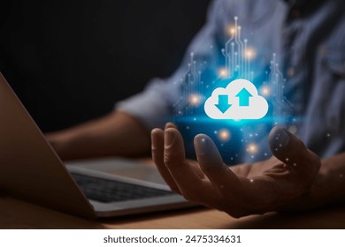 Blue Cloud Computing Technology or Cloud Storage Network Concept. Cloud Icon and Circuit Line on Business's Hand with Laptop Computer