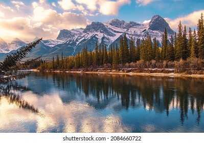 Blue Cloudy Sky Over Canmore Mountains And Bow River