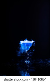 Blue Cocktail With Dry Ice Vapor