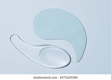 Blue collagen hydrogel eye patches on blue background. Beauty concept, cosmetics for skin care around the eyes, lifting, beauty salon, wrinkle removal. - Powered by Shutterstock