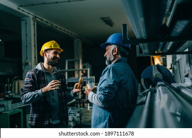 Blue Collar Workers Having Lunch Break