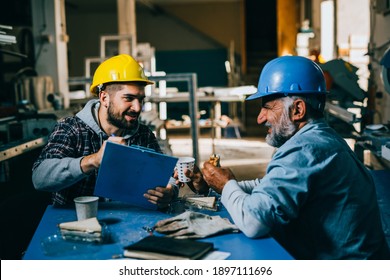 Blue Collar Workers Having Lunch Break