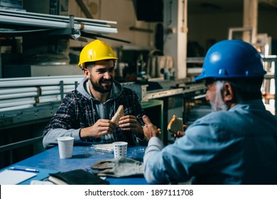 Blue Collar Workers Having Lunch Break