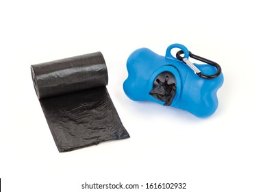 The Blue Color Dispenser And Pet Dog Waste Black Nylon Roll Pochette Isolated On The White Background. Compact Size Ultra-lightweight And It Is Designed With A Hanging Hook For Convenient Carrying. 