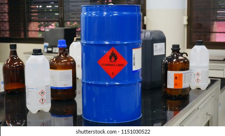 Blue color hazardous dangerous chemical drum barrels with red flammable liquid warning label and  Variety type of flammable liquid container