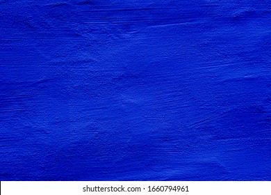 Blue colored abstract wall background with textures of different shades of blues - Shutterstock ID 1660794961