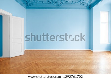 blue colored walls in new painted room , flat after renovation 