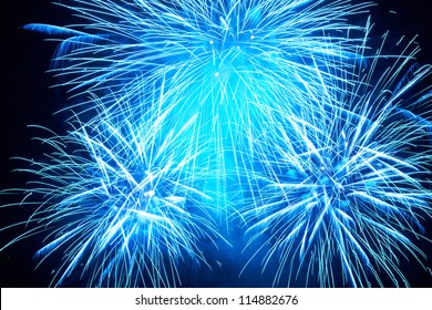 Blue Colorful Fireworks On The Black Sky Background