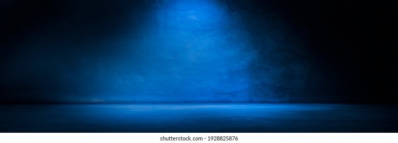 Blue concrete wall and floor with light and shadow backgrounds, use for product display for presentation and cover banner design.