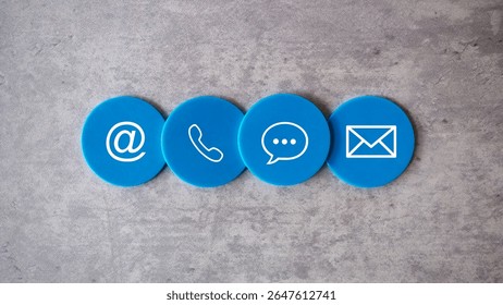 Blue Contact Us Icons on Grey Background: Email, Phone, Chat, and Mail Symbols for Customer Service