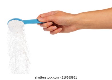 Blue container with Washing powder in hand,isolated on white - Shutterstock ID 219565981