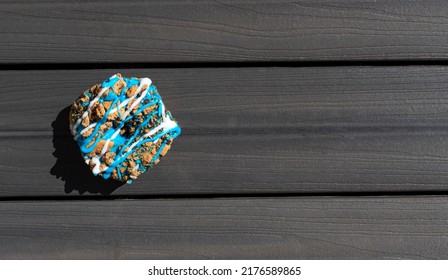 Blue Cookie Crumb Doughnut On Wood