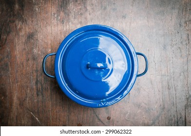 Blue Of Cooking Pot On Wooden Background