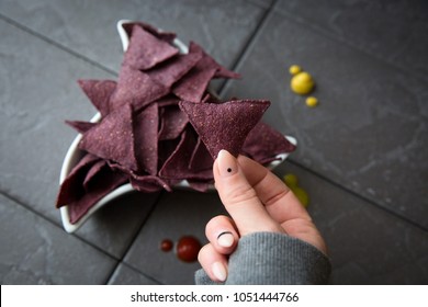 Blue Corn Tortilla Chips With Hand