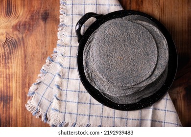 Blue Corn Tortillas. Food made with nixtamalized corn, a staple food in several American countries, an essential element in many Latin American dishes. - Shutterstock ID 2192939483