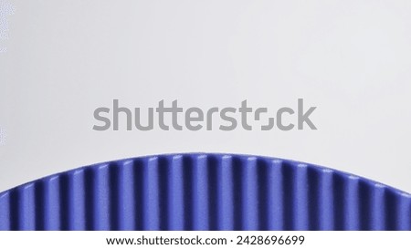 Blue corrugated texture on white background 