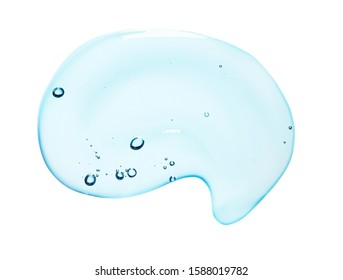 Blue cosmetic liquid gel texture with bubbles. Clear drop isolated on white background
