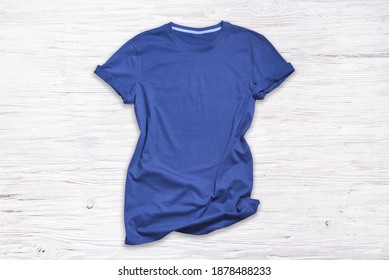 Blue Cotton Tshirt On Wooden Background, Mockup