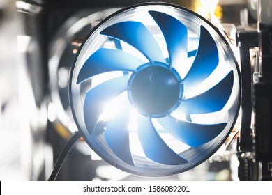 Blue Cpu Cooler Inside PC Case, Shiny Light Background