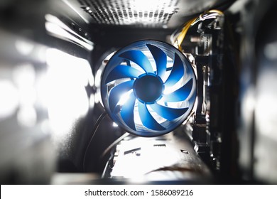 Blue Cpu Cooler Inside PC Case, Shiny Light Background