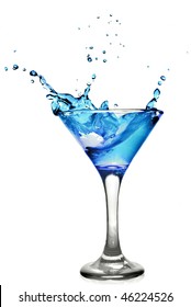 Blue curacao cocktail with splash isolated on white