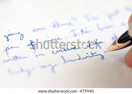 Blue cursive handwriting with pen