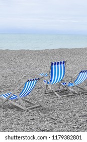 Blue Deck Chairs On Brighton Beach, England, UK