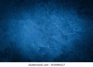 Blue decorative plaster texture with vignette. Abstract grunge background with copy space for design. - Shutterstock ID 1914496117