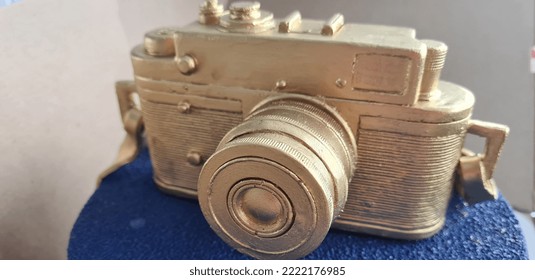 Blue Delicious Cake With Golden Chocolate Camera. Photographer Cake