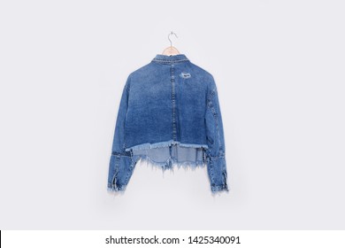 Blue Denim Back Jeans Ripped Destroyed Torn Jacket On Hanging 

