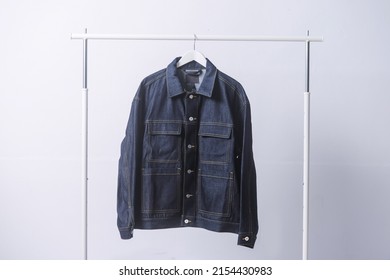 Blue Denim Jacket Close Up On Hanger 

