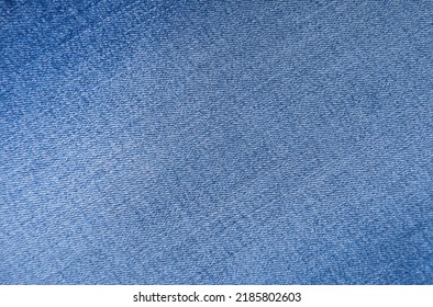 Blue denim jeans fabric stitch texture background

 - Shutterstock ID 2185802603