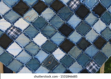 Blue Denim Rag Quilt Hanging Diagonally