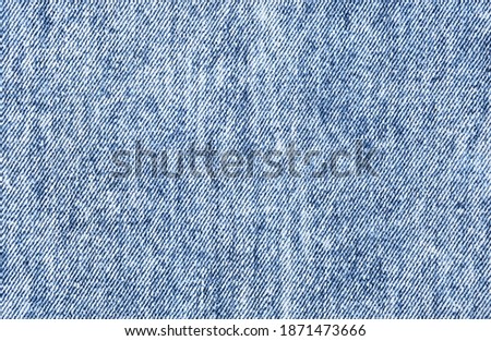 Blue denim texture background in 1990s style.