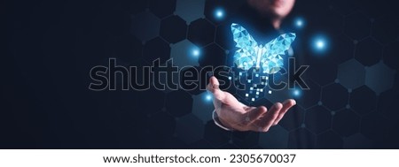 Blue Digital Butterfly on the businessman with glowing particles effect. Global business economy and digital transformation concept. Connectivity and Virtual reality theme. Copy space