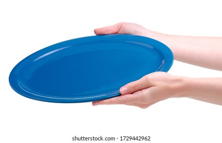 Blue dish plate in hand on a white background isolation - Shutterstock ID 1729442962