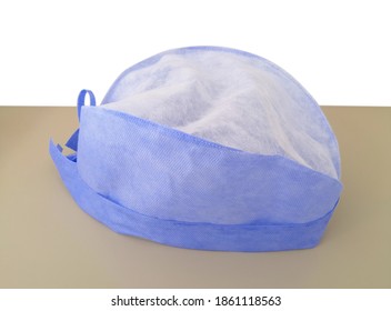 Blue Disposable Scrub Cap. Using In Medical Operating Room