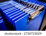 Blue Document Folder Files Organized in Office Storage Close Up