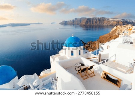 blue domes and volcano caldera with deep sea landscape, beautiful details of Santorini island, Greece