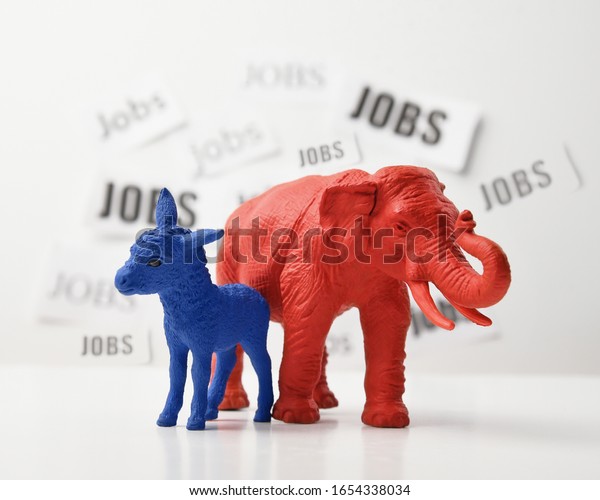 A blue donkey and a red elephant\
are against a white wall that has job text in the background for a\
2020 political issue of employment rate and the\
economy.