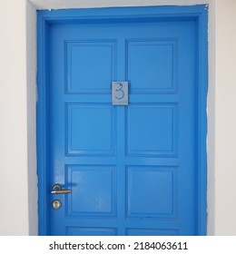 Blue Door Frame With Number Three In Mykonos Island, Greece, Mediterranean. Number 3. 