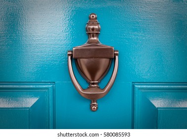 Blue Door  -  Freshly painted blue front door with bronze knocker