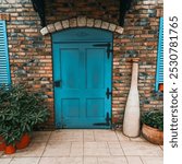 A blue door in front of a brick building with blue shutters.