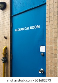 Blue Door To A Mechanical Room.