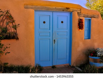 Blue Door On Adobe Home In Santa Fe, New Mexico, USA