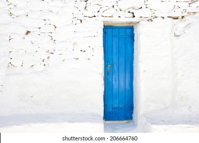 Blue Door Of A Traditional White House In Mykonos Island,Greece