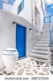 Blue Door And White Stairs On Mykonos Island.