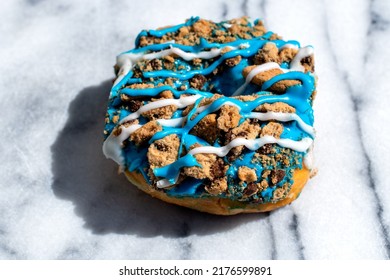 Blue Doughnut With Cookie Crumbs On Top