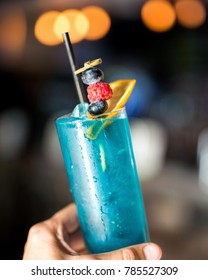 Blue Drink With Fruit Garnish